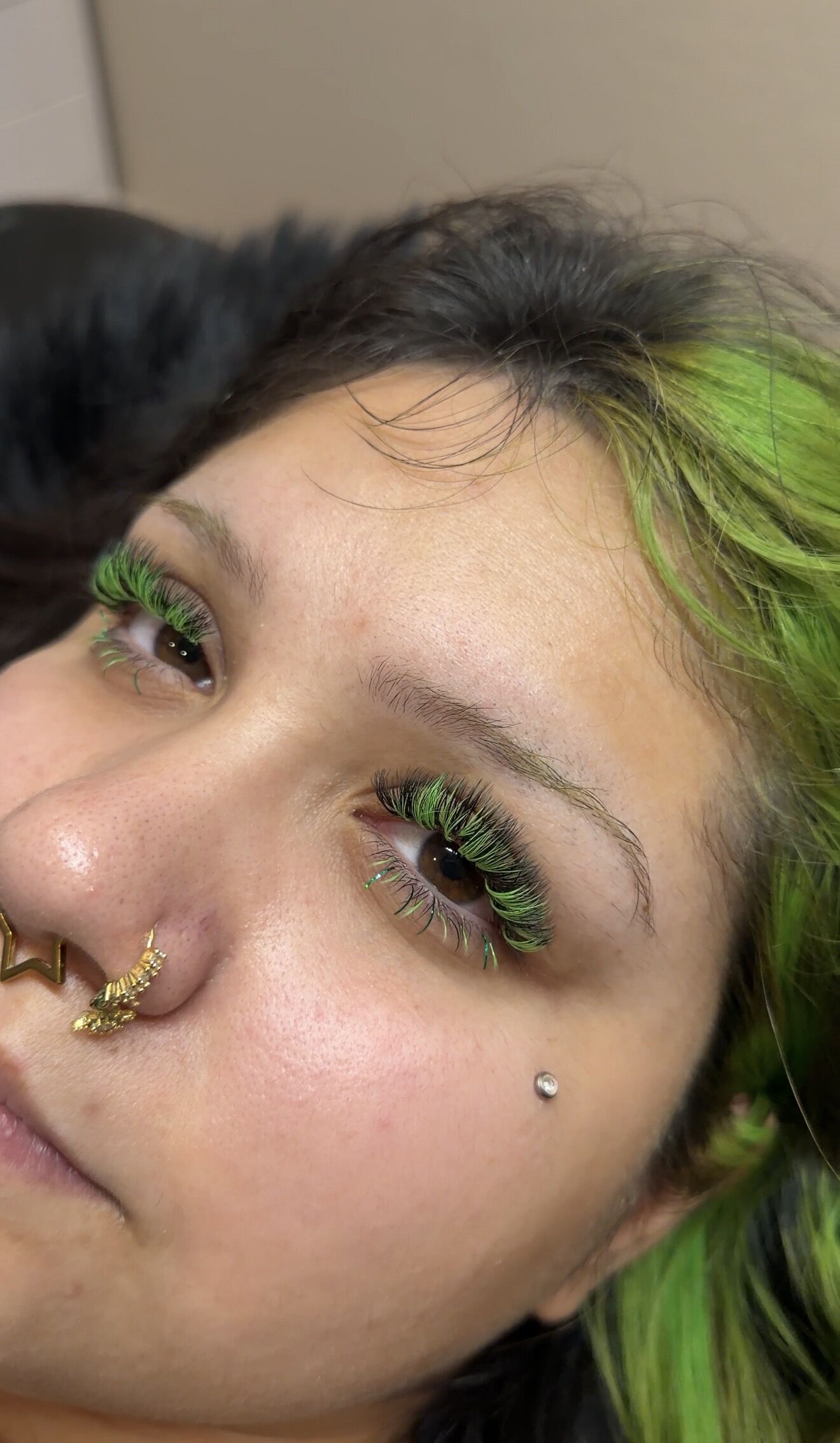 An anime set with vivid green lashes
